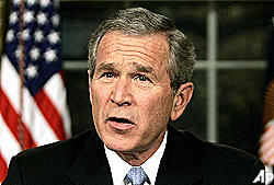 President Bush used for publicity ploy by seminar-selling group?